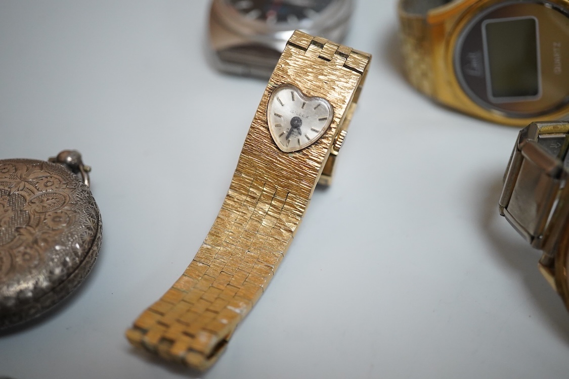 A lady's Edwardian silver and enamel fob watch, with Roman dial and heart shaped orifice, one other silver fob watch and four other white metal fob watches, together with a chrome cased Ingersoll pocket watch and eleven